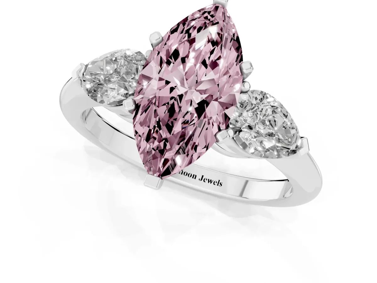 Fancy Pink Three-Stone Marquise Cut Diamond Ring with Pear Side Stones and Four-Prong Setting Silver