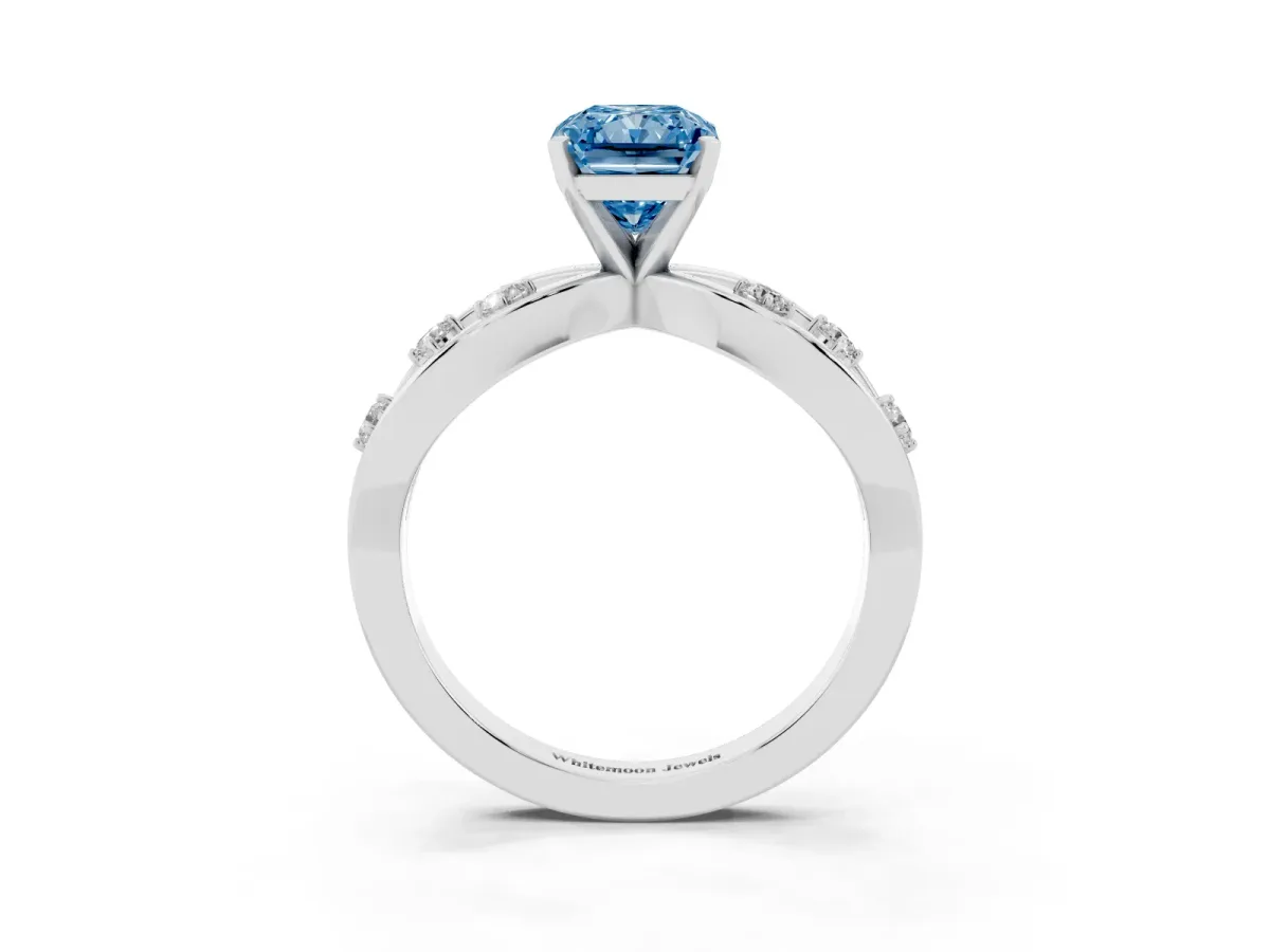 Fancy Blue Radiant Cut Cut Solitaire Diamond with Side Stones on Criss-Cross Band and Four-Prong Setting Platinum