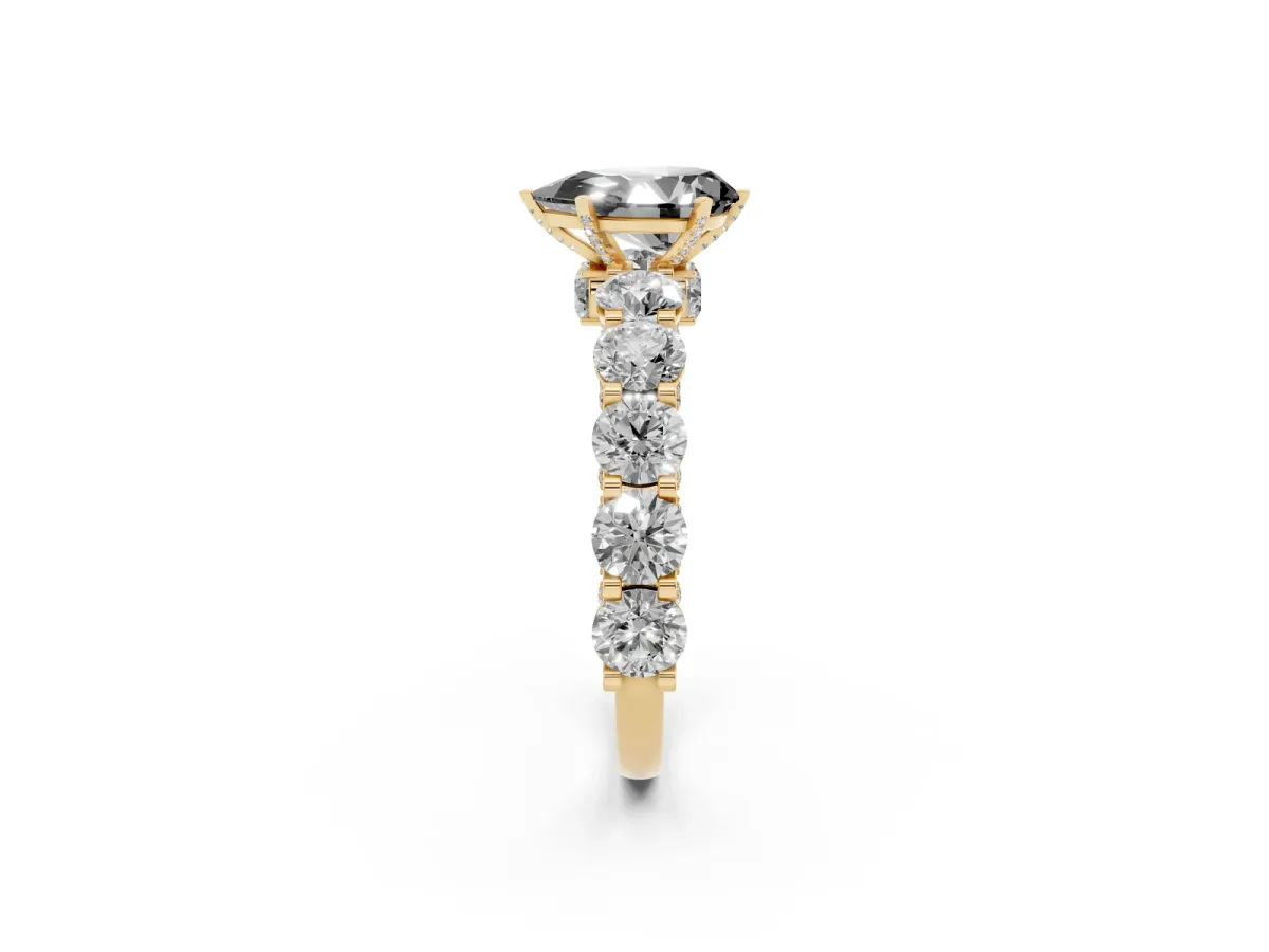 Fancy Black Pear Cut Diamond Side Stone Engagement Ring with Four-Prong Setting Yellow gold