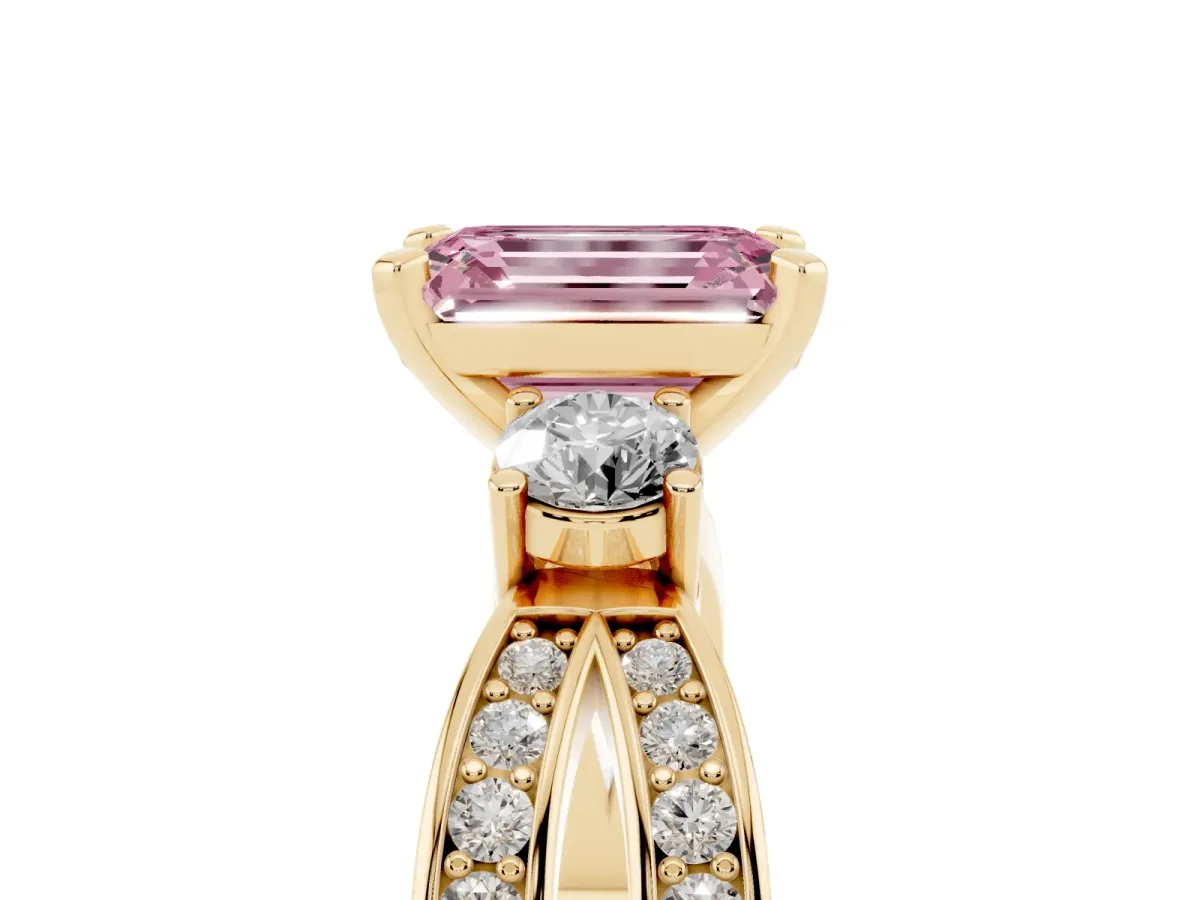 Fancy Pink Three-Stone Emerald Cut Cut Diamond Twist Band with Prong Setting Yellow gold