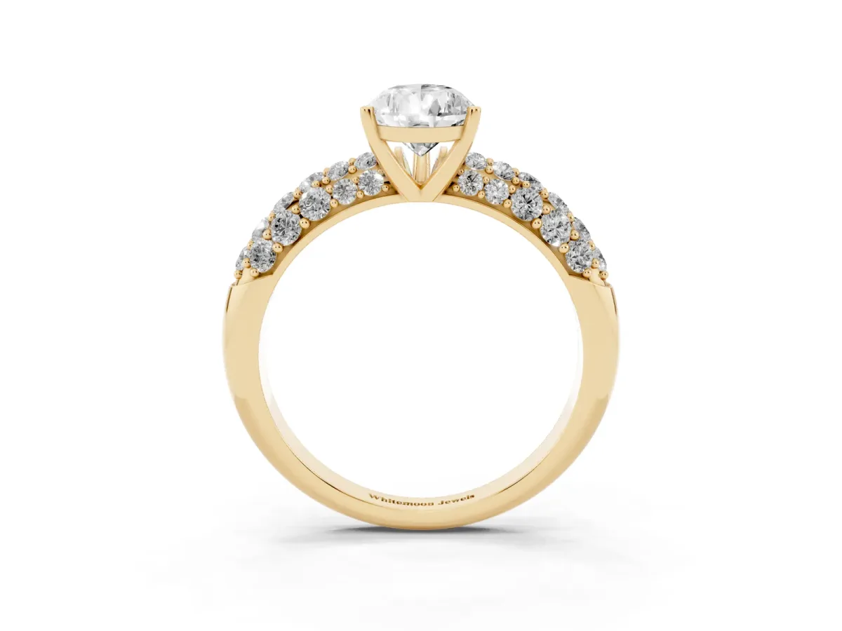 Pear Cut Diamond Pavé Band Solitaire Ring with Four-Prong Setting Yellow gold