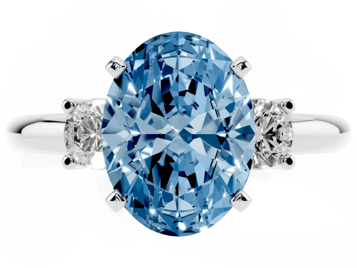 Fancy Blue Three-Stone Oval Cut Cut Diamond Solitaire with Prong Setting and Classic Band Platinum