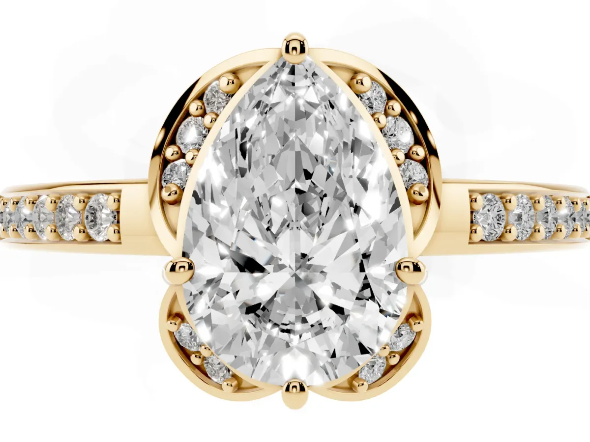 Pear Cut Cut Halo Diamond Ring with Channel Set Band and Four-Prong Setting Yellow gold