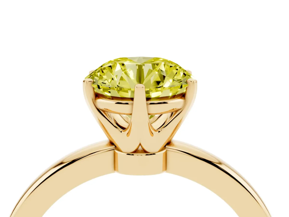 Fancy Yellow Round Cut Solitaire Diamond Ring with Six-Prong Setting on a Classic Band Yellow gold