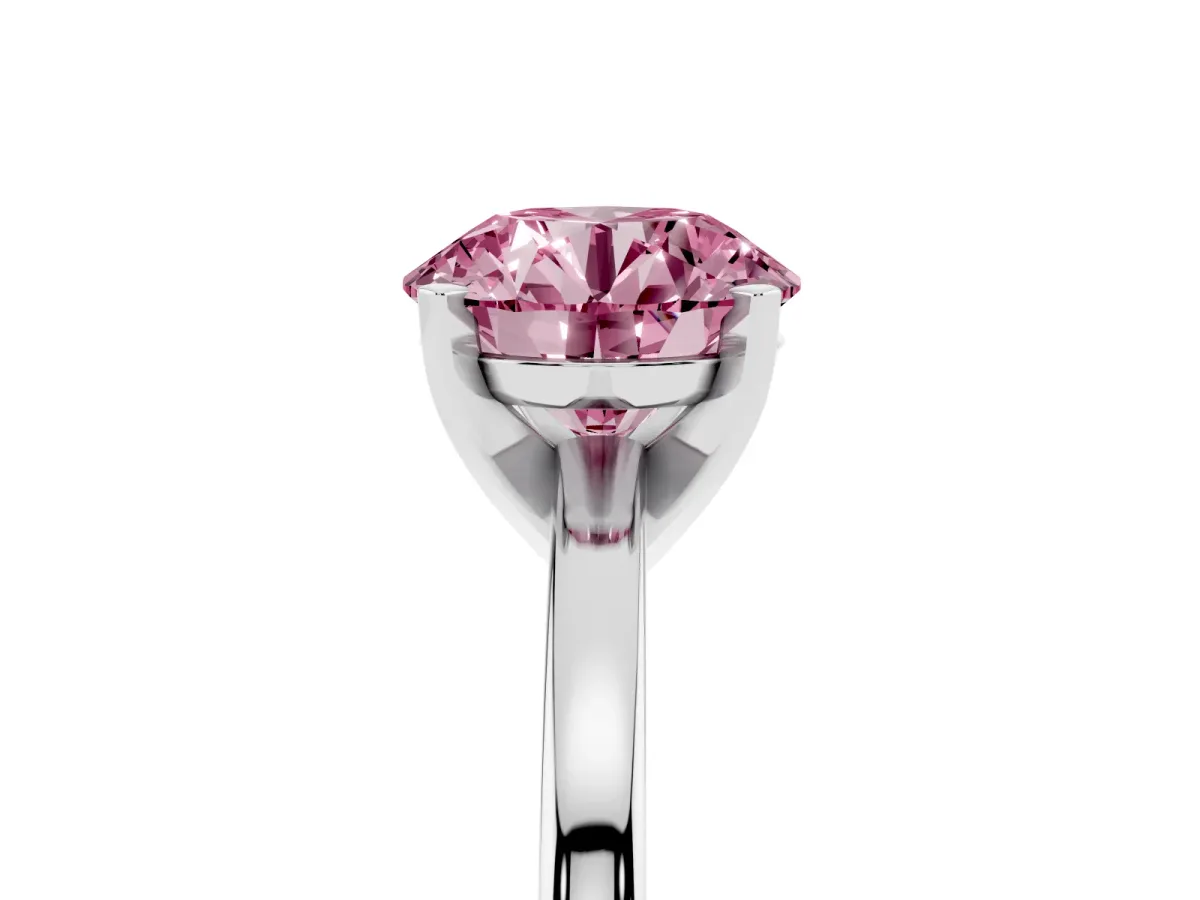 Fancy Pink Round Cut Solitaire Diamond Engagement Ring with Four-Prong Setting on a Classic Band Platinum