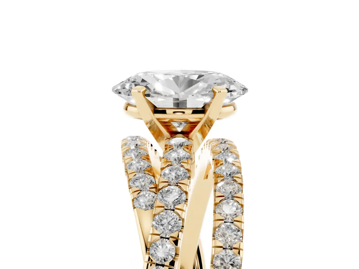 Oval Cut Solitaire Twist Band with Pavé Setting and Four-Prong Setting Yellow gold