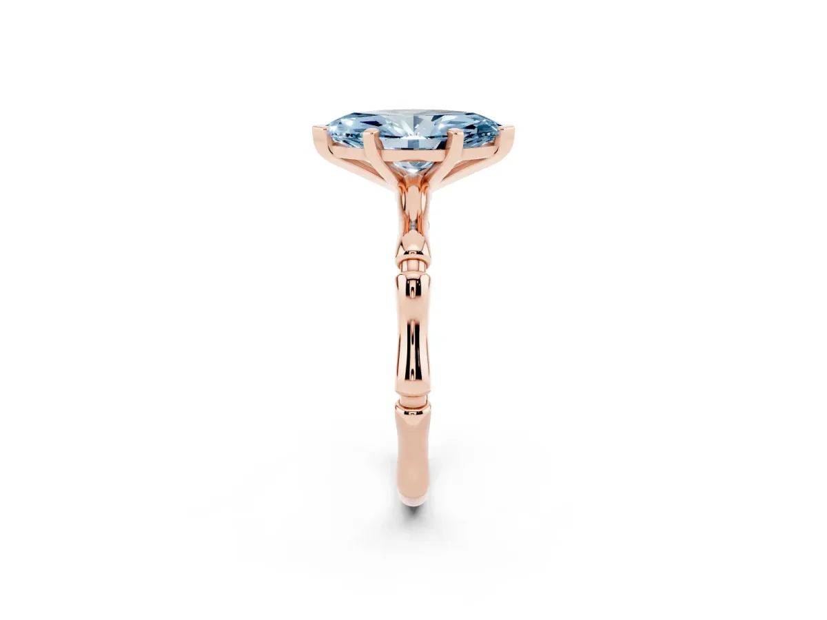Fancy Blue Marquise Cut Solitaire Diamond Ring with Bamboo Band and Four-Prong Setting Rose gold