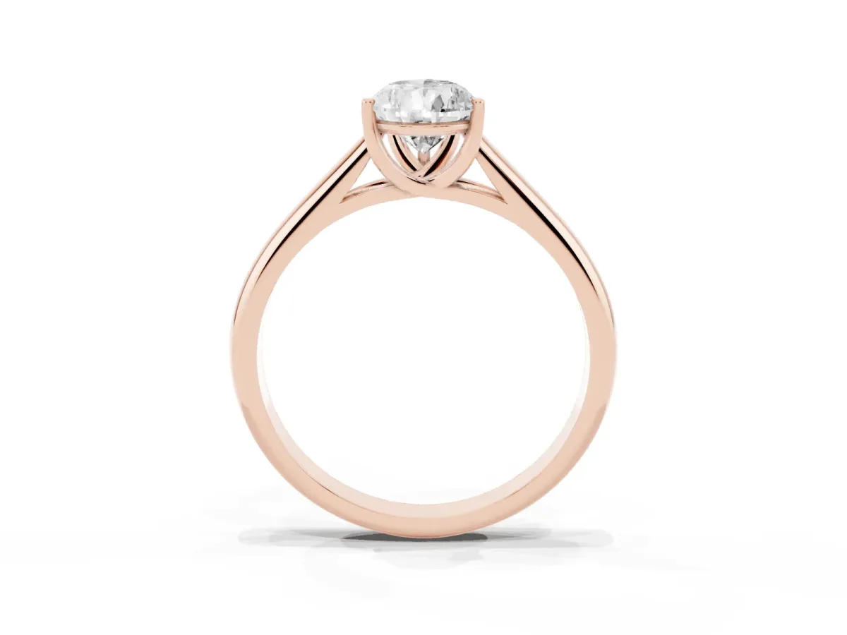 Pear Cut Solitaire Engagement Ring with Tapered Band and Four-Prong Setting Rose gold