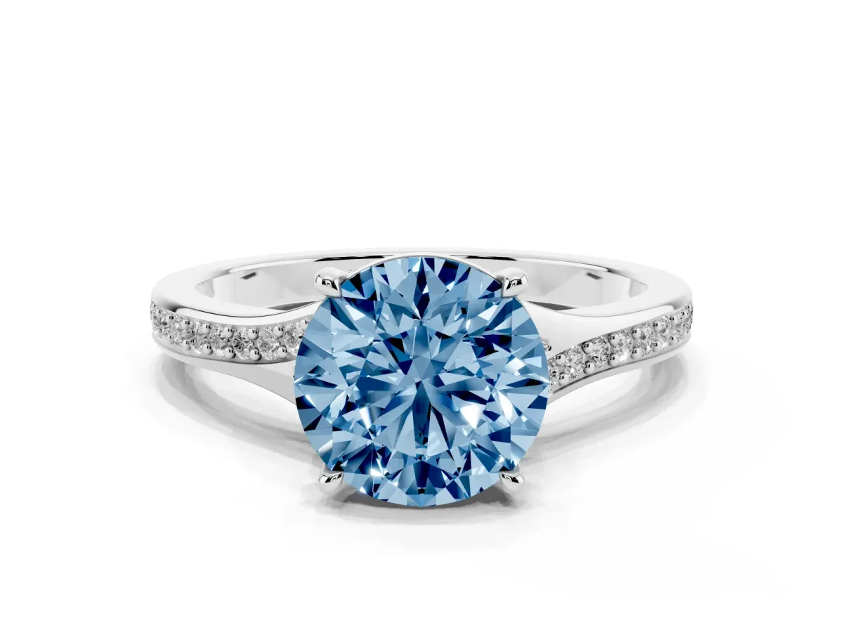 Fancy Blue Round Cut Diamond Solitaire Ring with Pavé Band and Prong Setting Silver