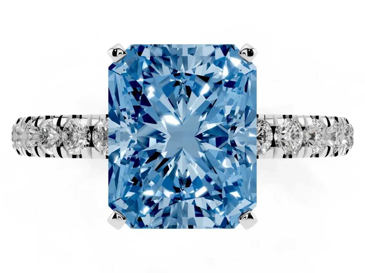 Fancy Blue Radiant Cut Diamond Solitaire Ring with Pavé Accents and Four-Prong Setting Silver