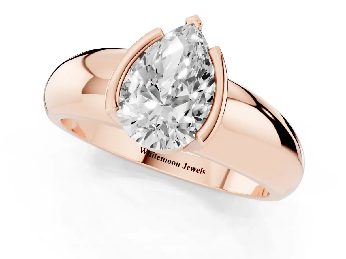 Pear Cut Solitaire Tension Set Diamond Ring with Wide Band Rose gold