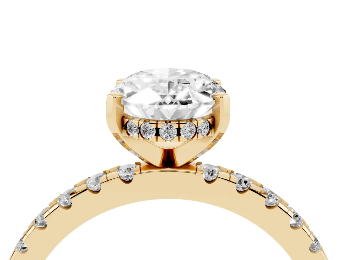 Oval Cut Diamond Solitaire Ring with Round Pavé Band and Four-Prong Setting Yellow gold