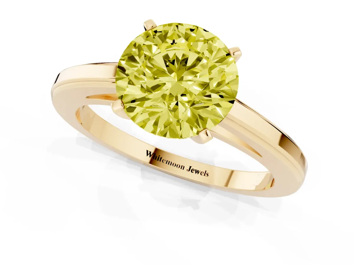 Fancy Yellow Round Cut Solitaire Diamond Ring with Four-Prong Setting and Classic Band Yellow gold