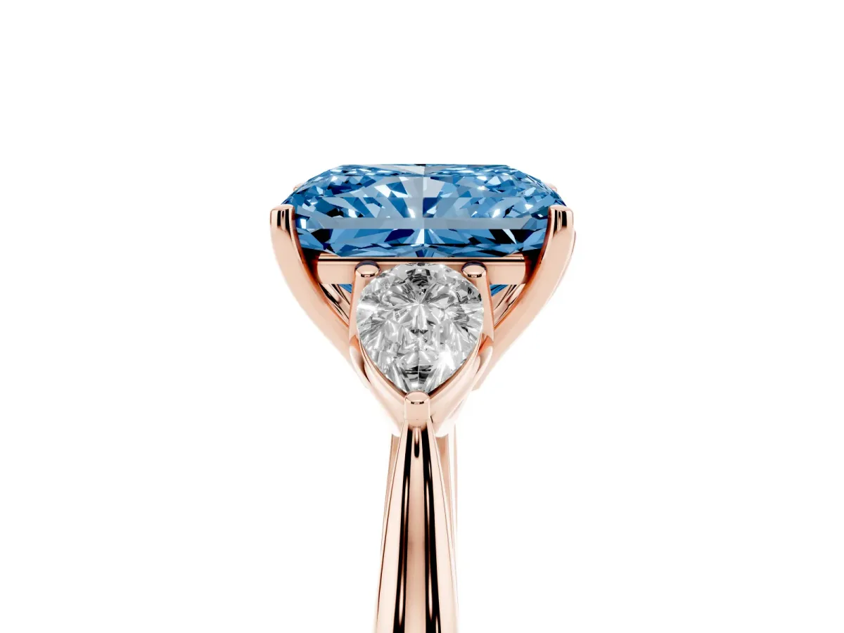 Fancy Blue Three-Stone Radiant Cut Brilliant Diamond Solitaire Ring with Tapered Band and Four-Prong Setting Rose gold