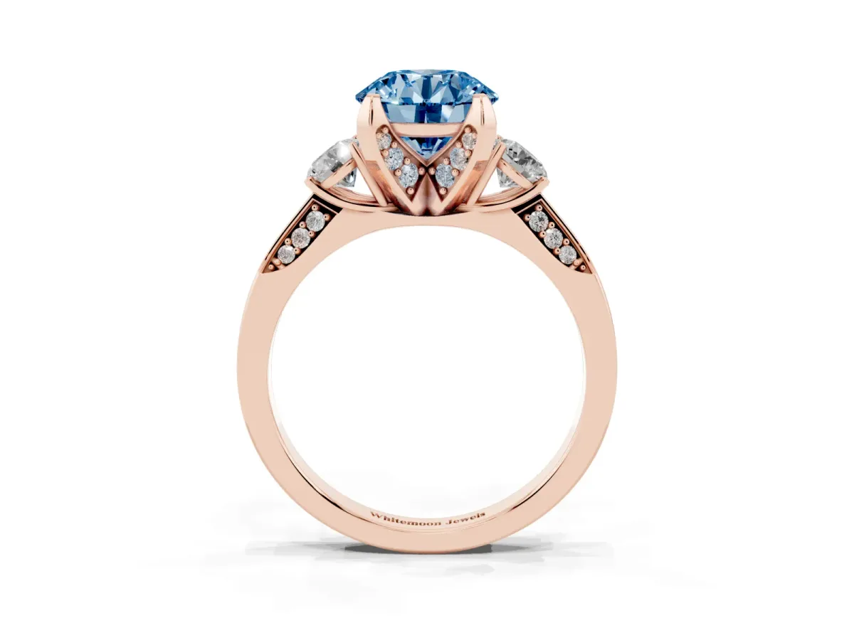 Fancy Blue Round Cut Brilliant Three-Stone Diamond Ring with Pavé Band and Four-Prong Setting Rose gold