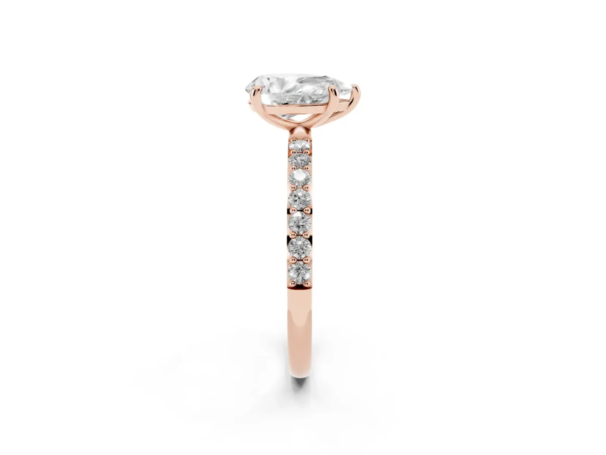 Pear Cut Diamond Solitaire Ring with Round Pavé Band and Prong Setting Rose gold