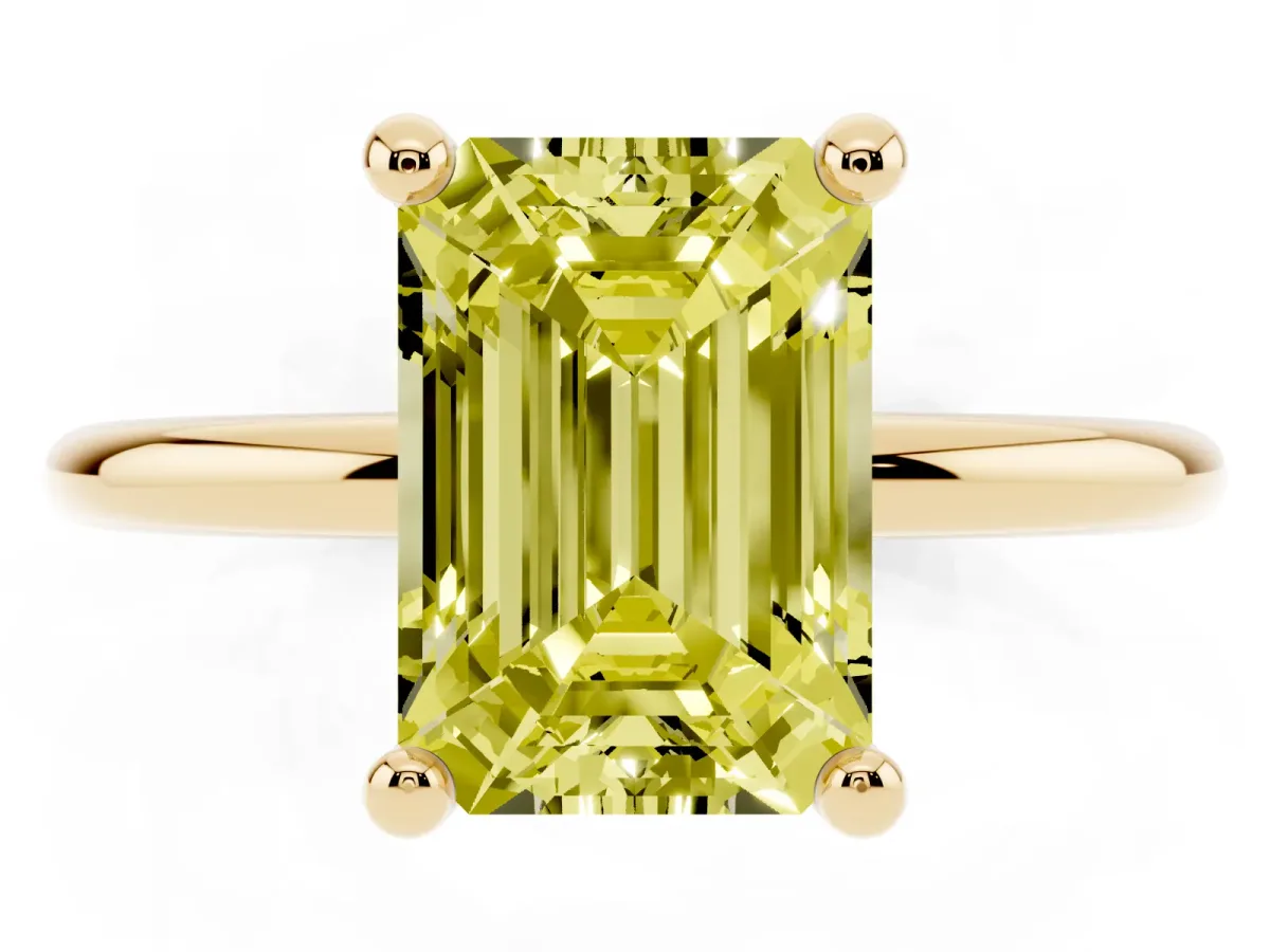 Fancy Yellow Emerald Cut Solitaire Diamond Ring with 4-Prong Setting on a Classic Band Yellow gold