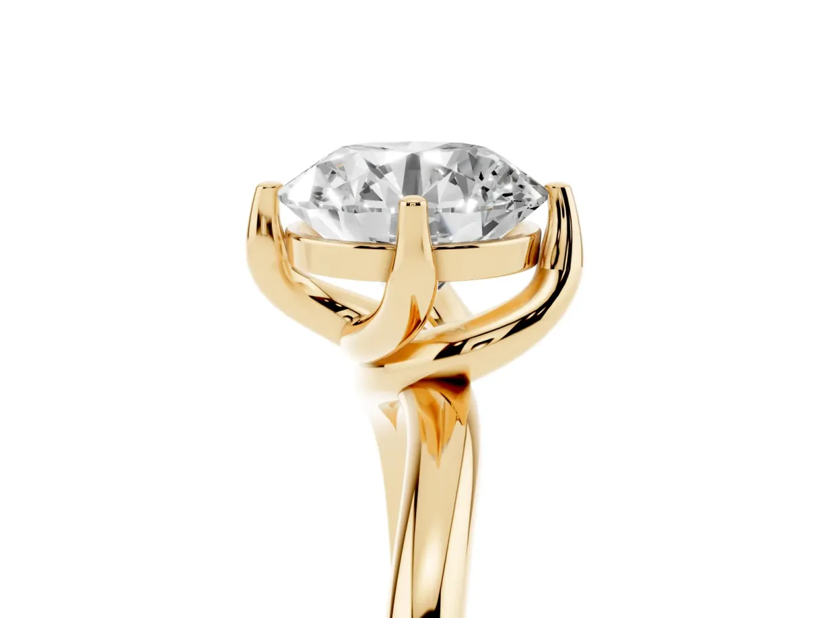 Round Cut Diamond Solitaire Engagement Ring with Four-Prong Setting and Classic Band Yellow gold