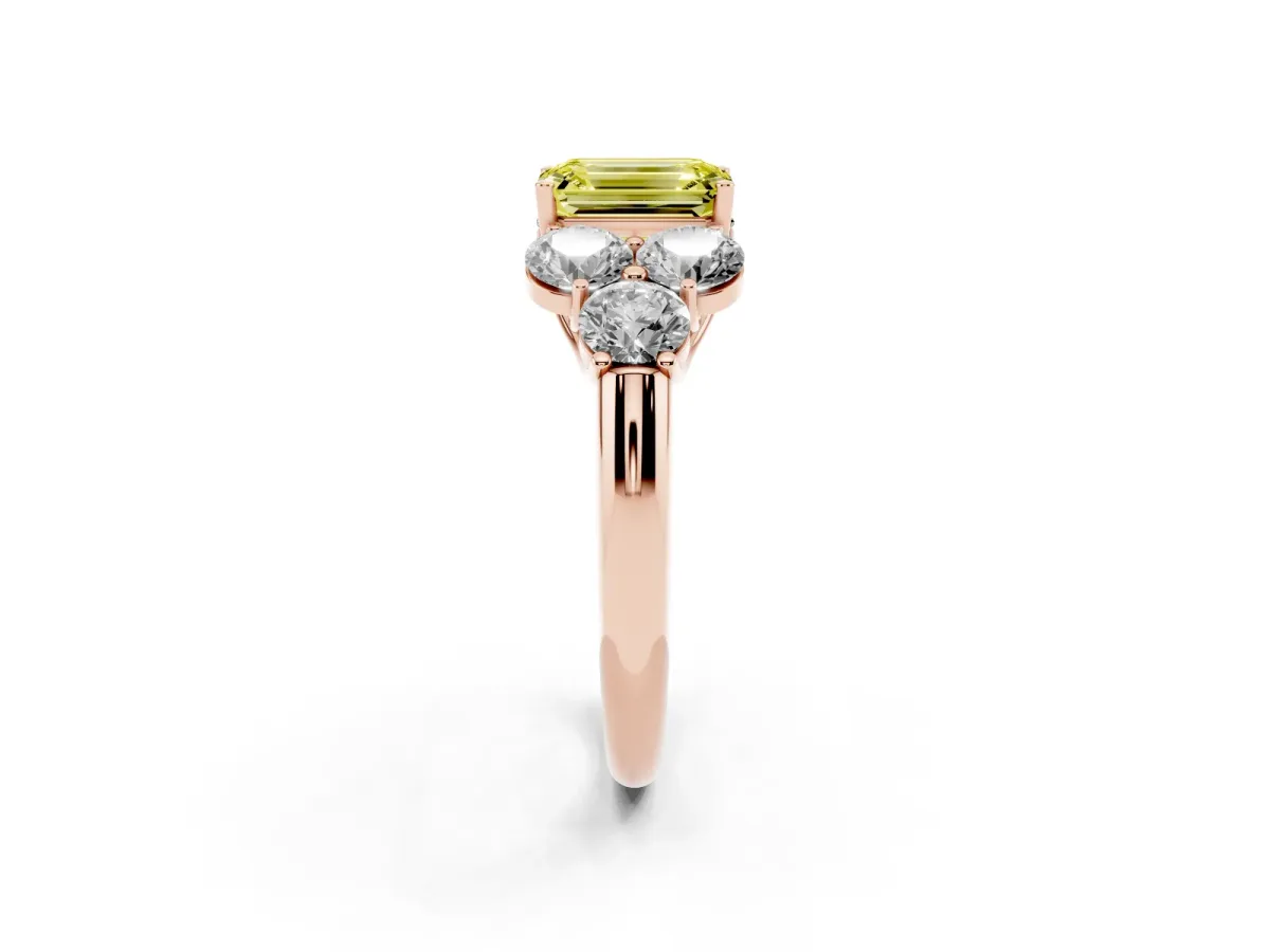 Fancy Yellow Emerald Cut Cut Diamond Cluster Ring with Round Accent Stones and Prong Setting on a Classic Band Rose gold