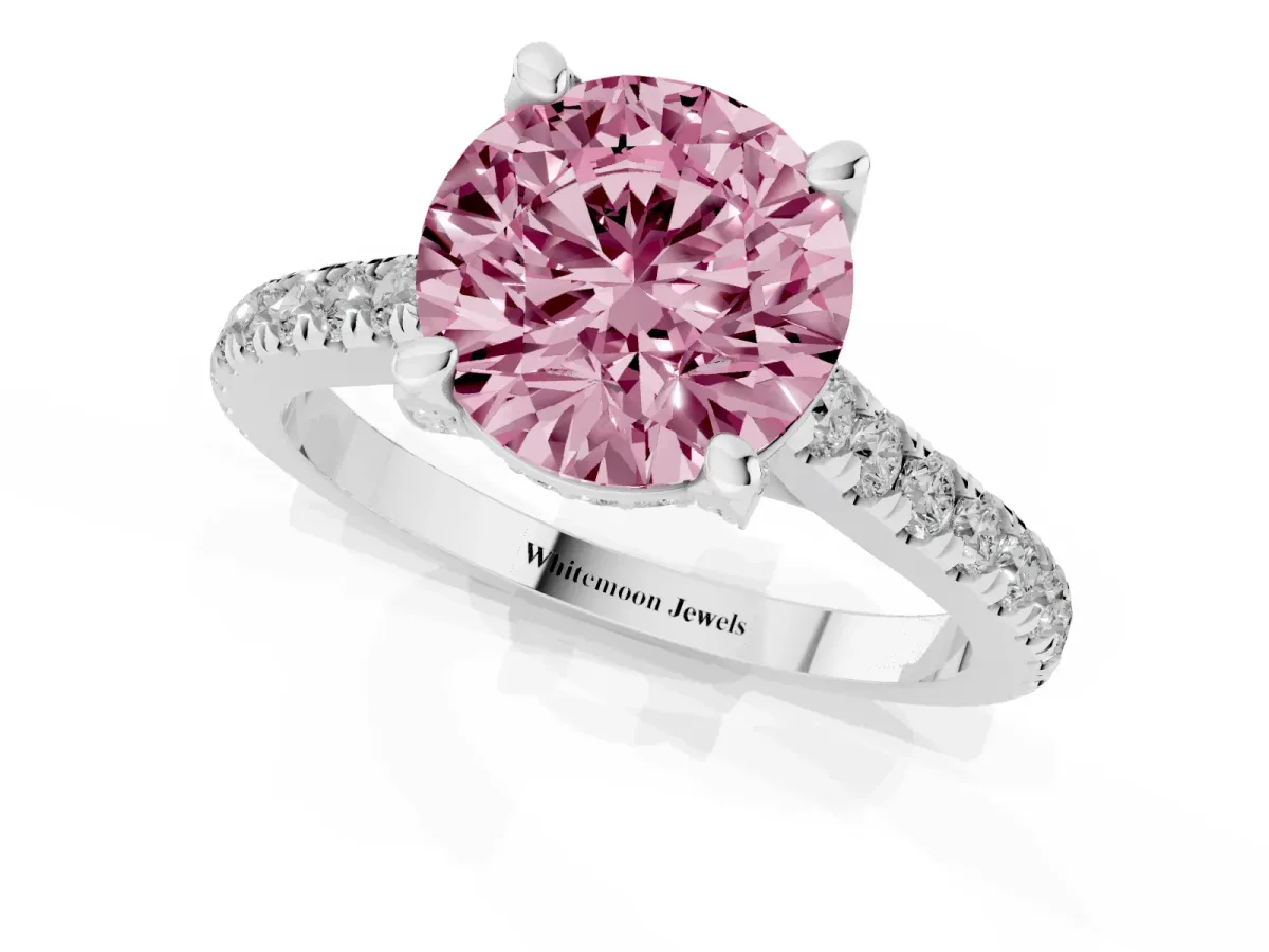 Fancy Pink Round Cut Brilliant Diamond Solitaire with Pavé Band and Four-Prong Setting White gold