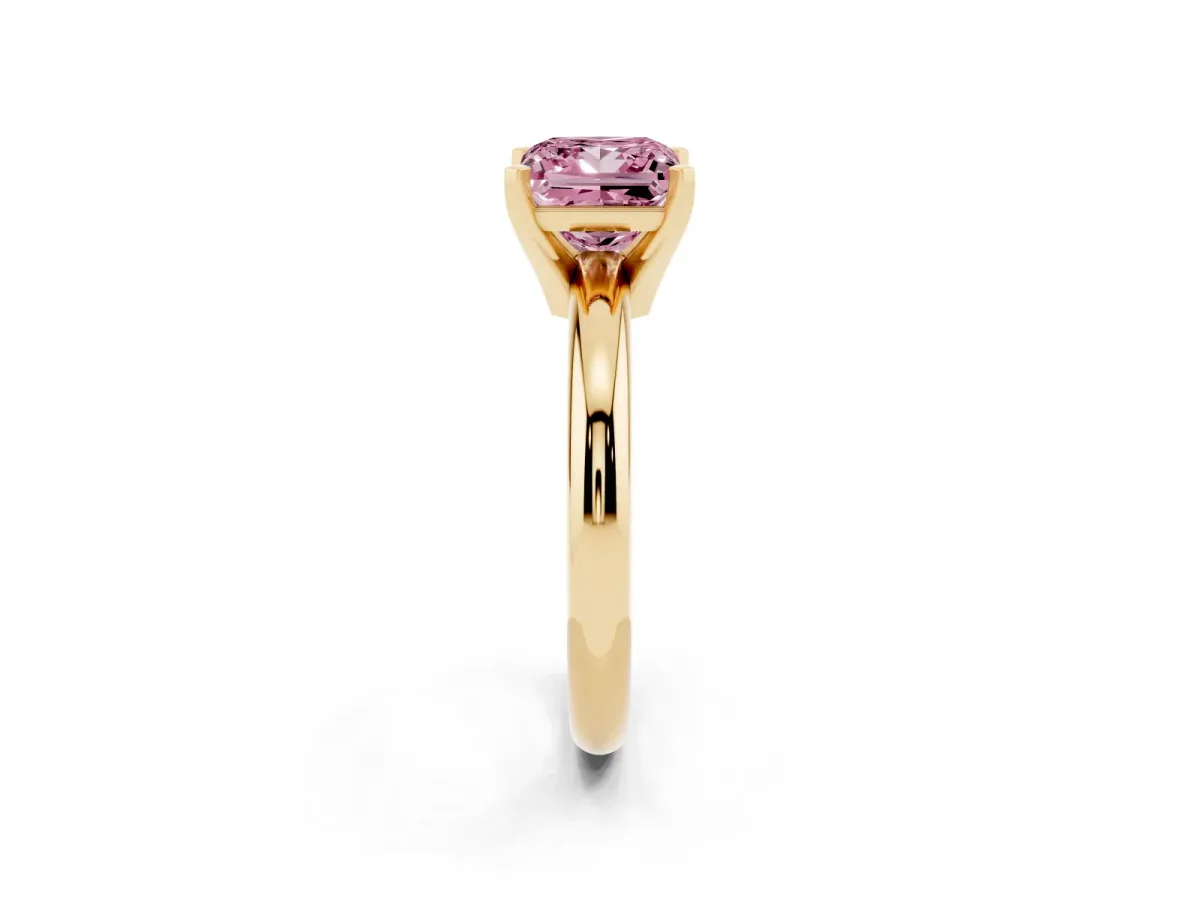 Fancy Pink Princess Cut Diamond Solitaire Engagement Ring with Round Band and Four-Prong Setting Yellow gold