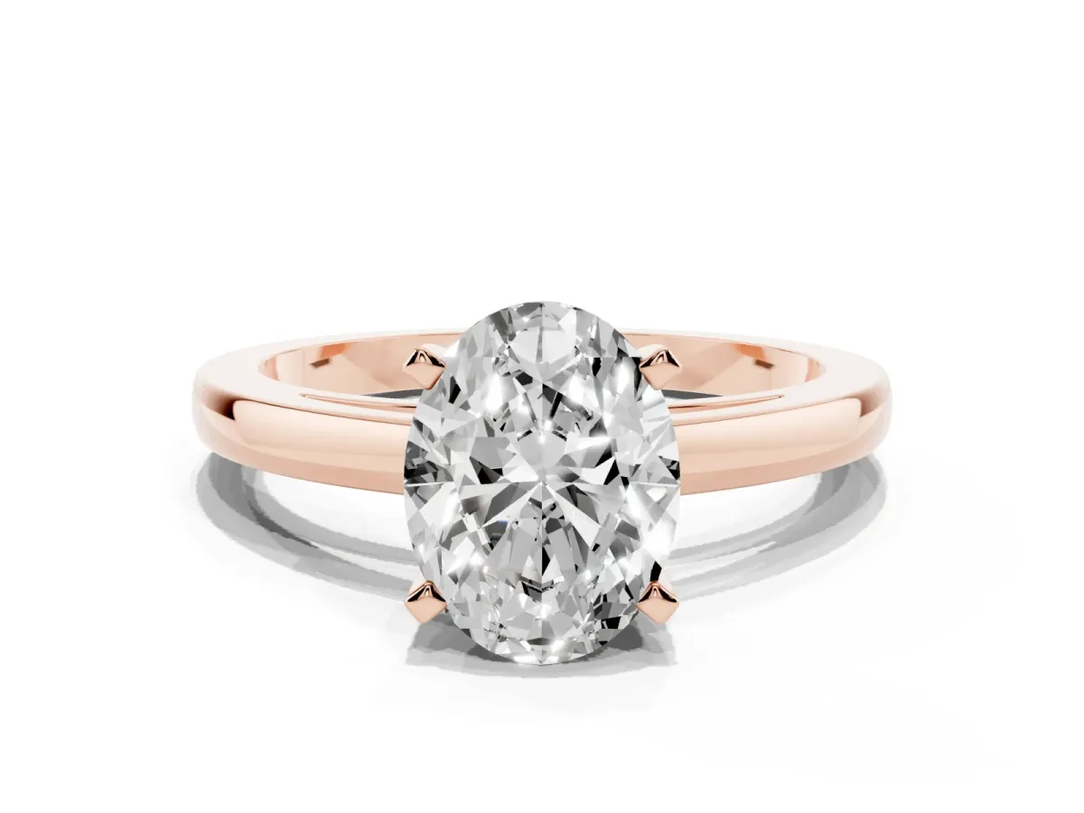 Oval Cut Solitaire Diamond Engagement Ring with Four-Prong Setting on a Classic Band Rose gold