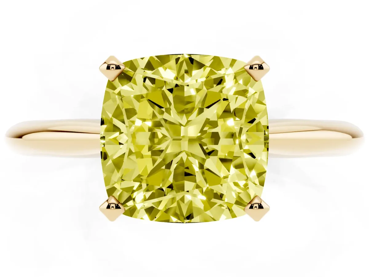 Fancy Yellow Cushion Cut Cut Solitaire Ring with Four-Prong Setting on a Classic Band Yellow gold