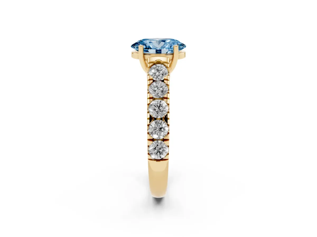 Fancy Blue Oval Cut Cut Diamond Solitaire Ring with Micro Pave Band and Prong Setting Yellow gold