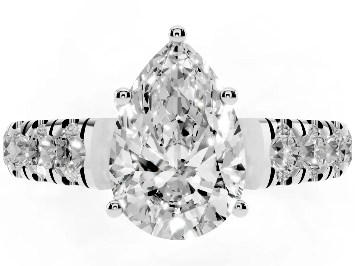 Pear Cut Cut Diamond Solitaire Ring with Micro Pave Band and Prong Setting Platinum