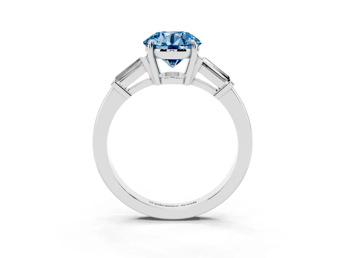 Fancy Blue Round Cut Diamond Three-Stone Ring with Tapered Baguette Side Stones and Prong Setting Silver