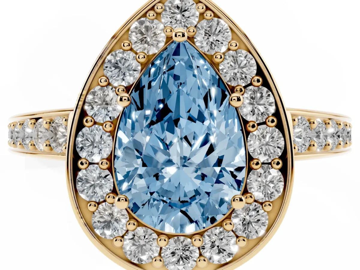 Fancy Blue Pear Cut Halo Pavé Diamond Engagement Ring with Bezel Setting Yellow gold
