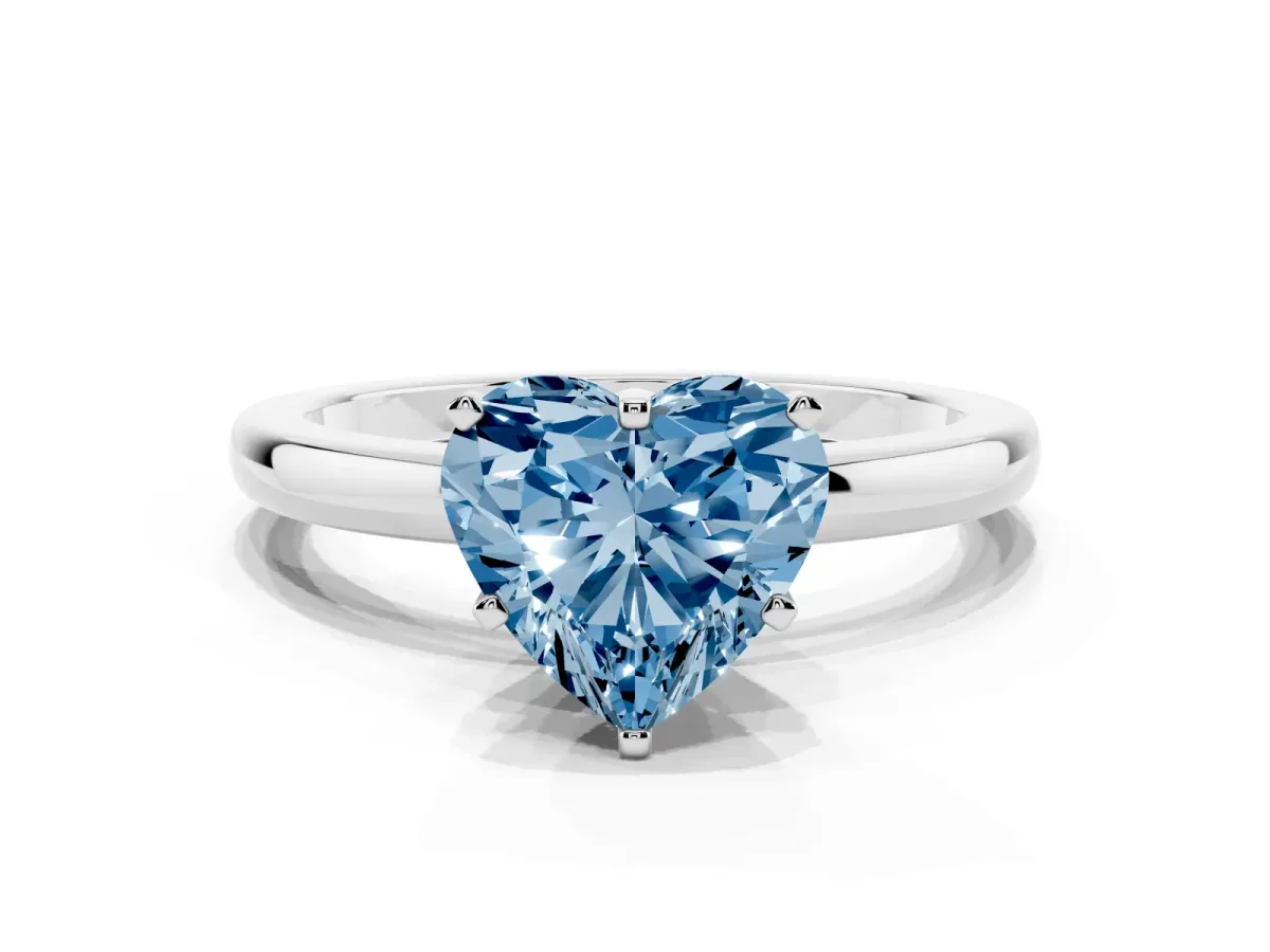 Fancy Blue Heart Cut Solitaire Diamond Ring with Six-Prong Setting on a Classic Band Platinum