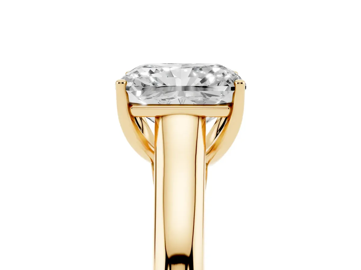 Radiant Cut Solitaire Engagement Ring with Tapered Band and Four-Prong Setting Yellow gold