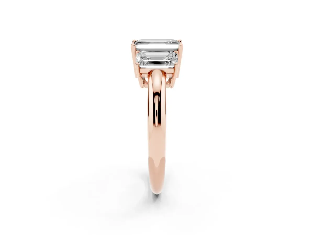 Fancy Black Three-Stone Emerald Cut Cut Diamond Engagement Ring with Prong Setting on a White Gold Band Rose gold