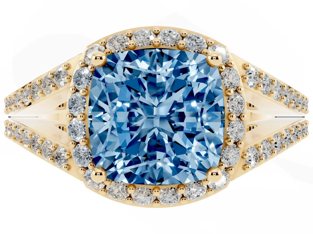 Fancy Blue Cushion Cut Halo Split Shank Pave Diamond Ring with Four-Prong Setting Yellow gold