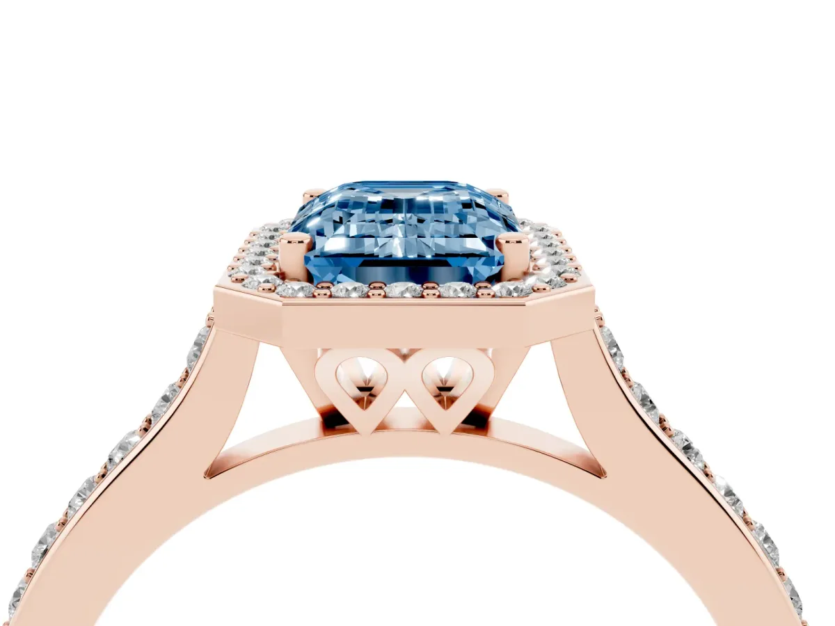 Fancy Blue Emerald Cut Diamond Halo Engagement Ring with Round Pavé Shoulders and Prong Setting Rose gold