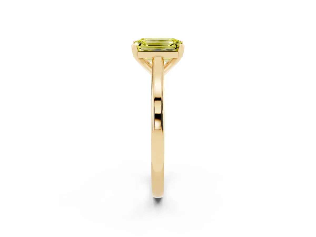 Fancy Yellow Emerald Cut Solitaire Diamond Ring with Four-Prong Setting and Classic Band Yellow gold
