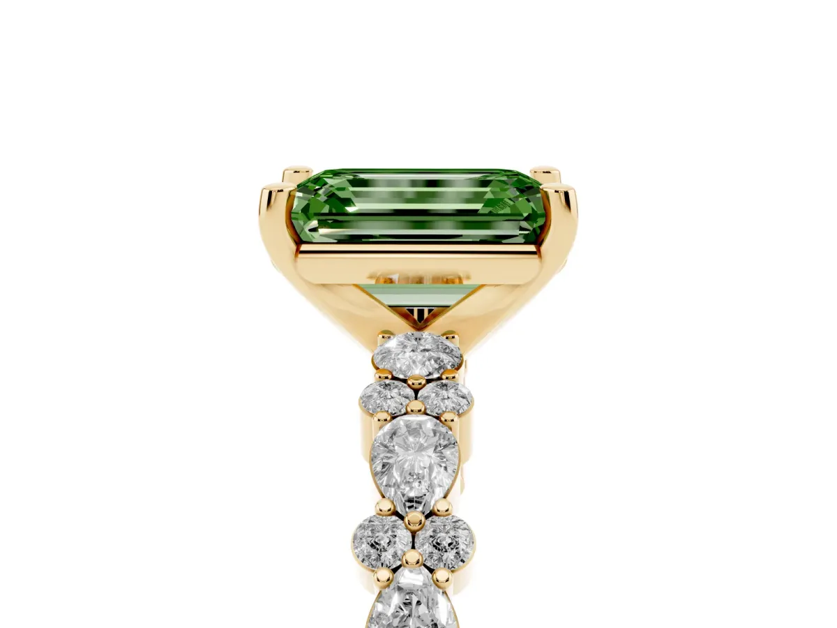 Fancy Green Emerald Cut Diamond Side Stone Solitaire Ring with Round and Four-Prong Setting Yellow gold