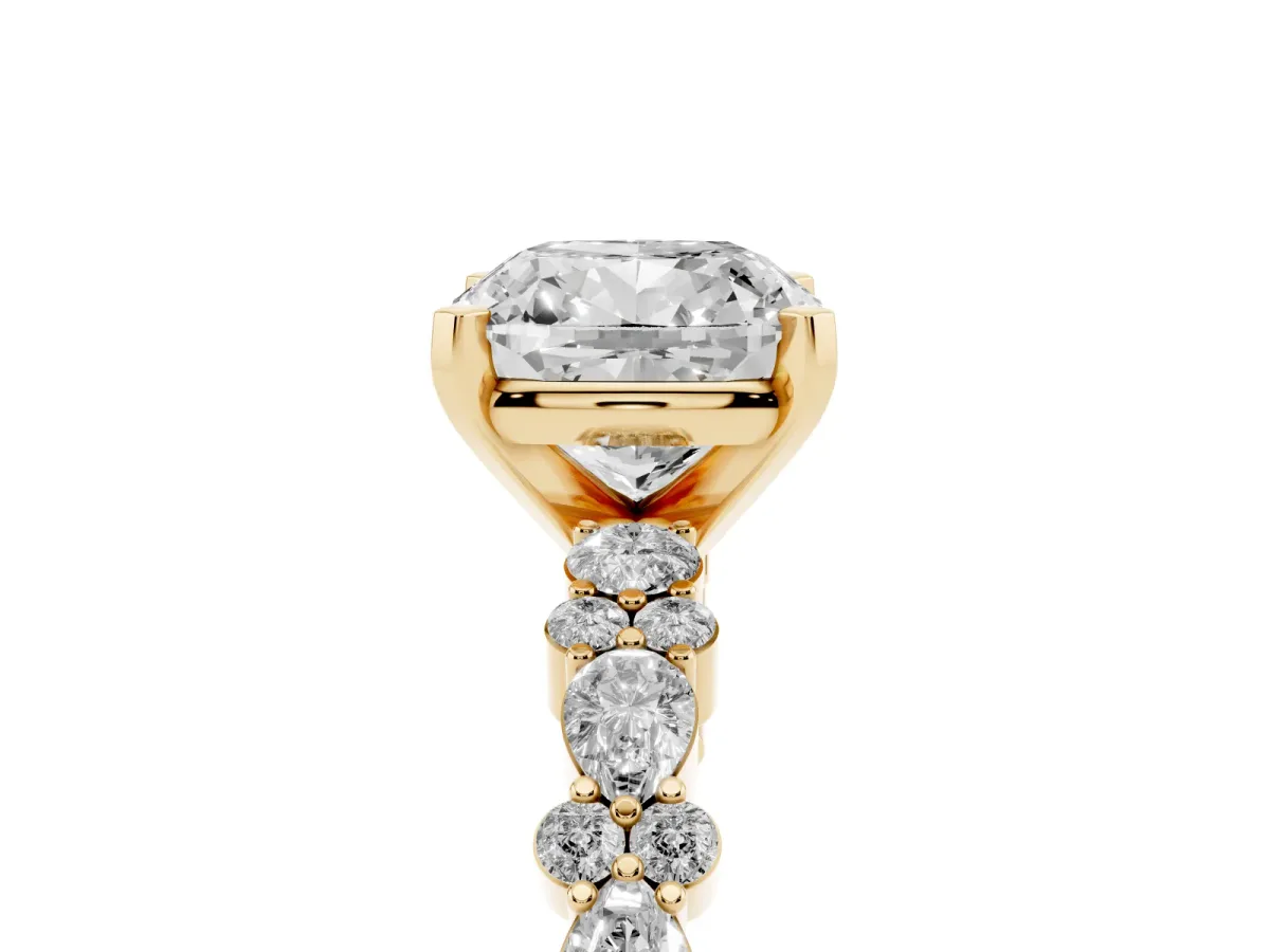 Cushion Cut Diamond Side Stone Solitaire Ring with Round and Four-Prong Setting Yellow gold