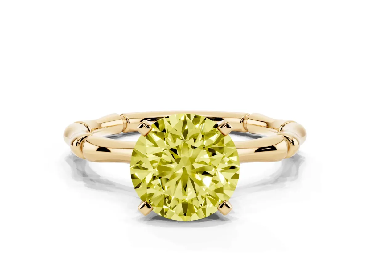 Fancy Yellow Round Cut Solitaire Diamond Ring with Bamboo Band and Four-Prong Setting Yellow gold