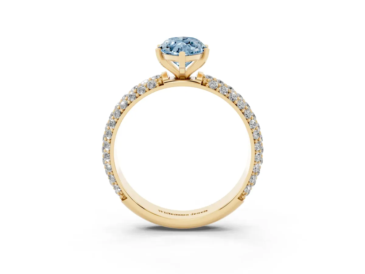 Fancy Blue Marquise Cut Diamond Solitaire Ring with Prong Setting and Pavé Band Yellow gold