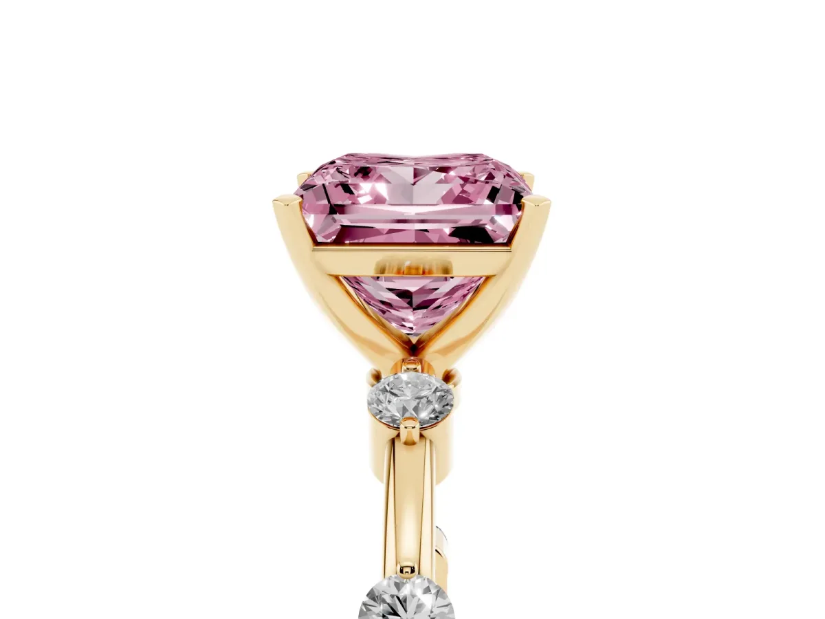 Fancy Pink Princess Cut Solitaire Diamond Ring with Bezel Set Side Stones and Prong Setting Yellow gold