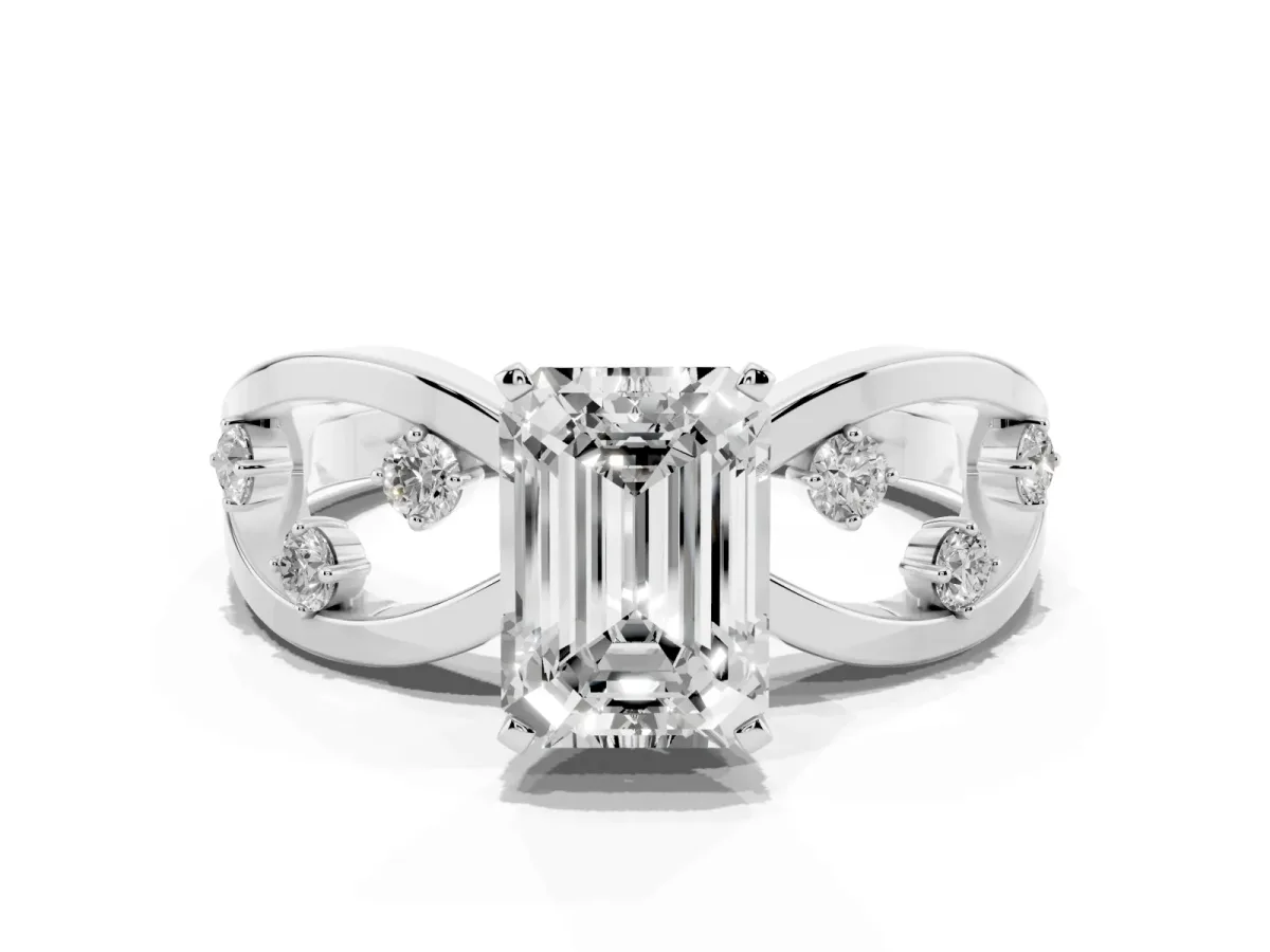 Emerald Cut Cut Solitaire Diamond with Side Stones on Criss-Cross Band and Four-Prong Setting Platinum