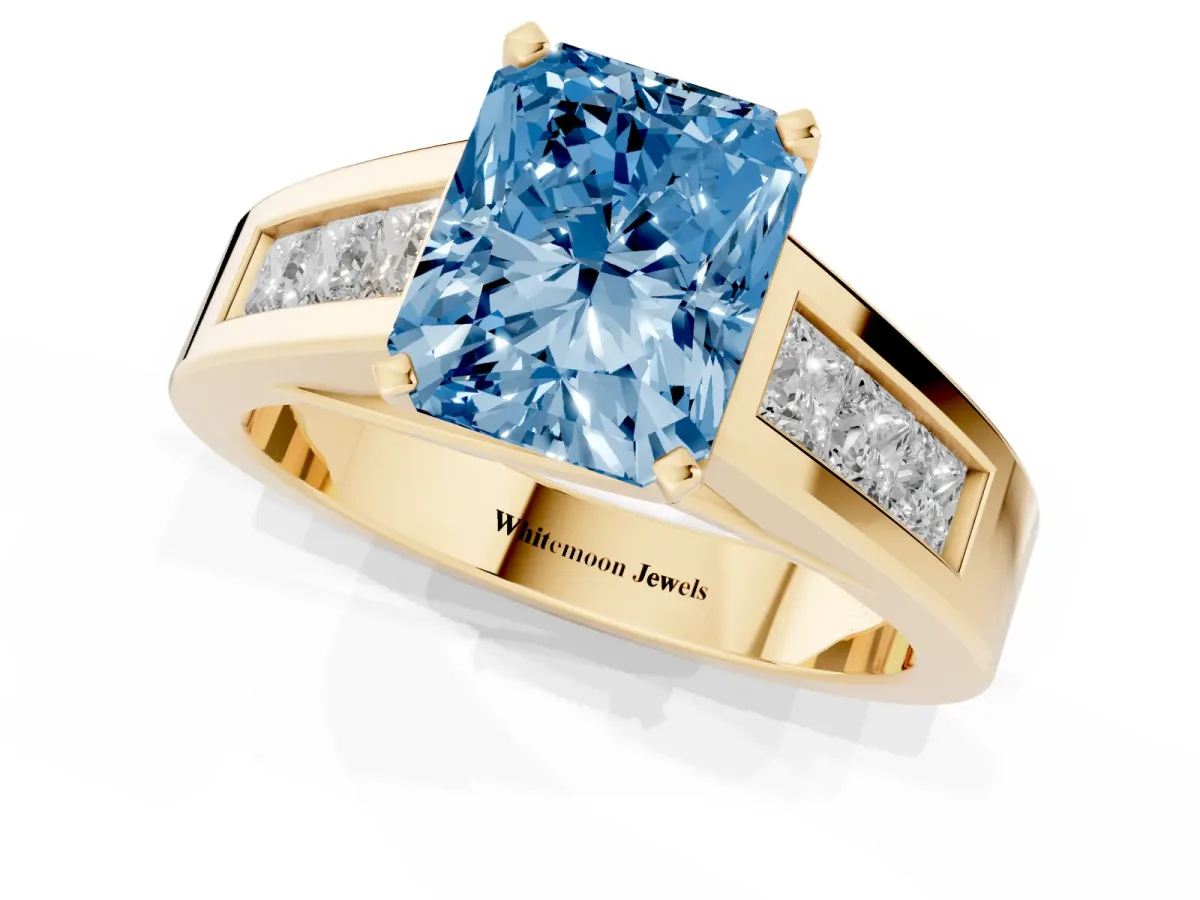 Fancy Blue Radiant Cut Cut Channel Set Solitaire Ring with Four-Prong Setting Yellow gold