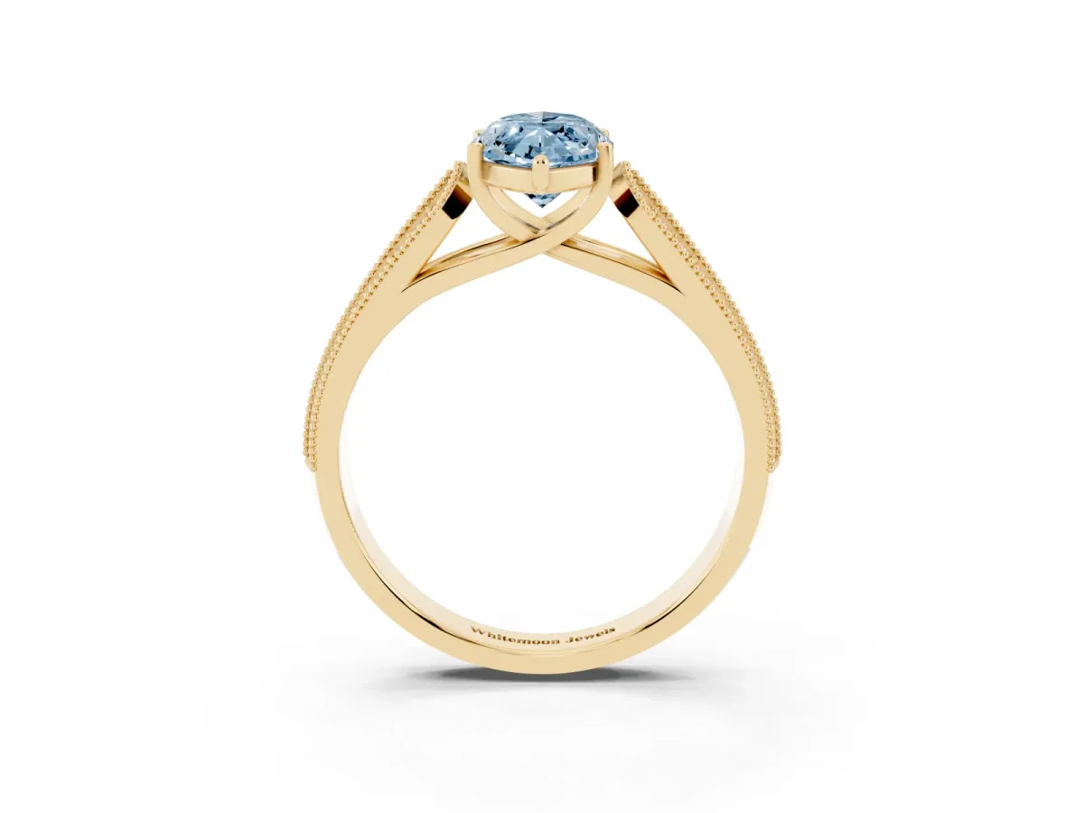 Fancy Blue Marquise Cut Cut Pave Split Shank Engagement Ring with Four-Prong Setting Yellow gold