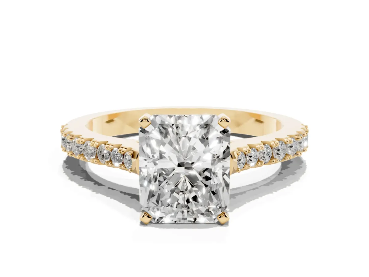 Radiant Cut Cut Solitaire Diamond Engagement Ring with Pave Band and Four-Prong Setting Yellow gold