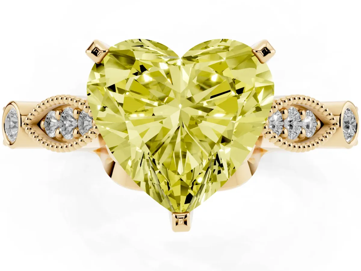Fancy Yellow Heart Cut Cut Diamond with Milgrain Marquise and Bezel Accents on a Solitaire Band with Prong Setting Yellow gold