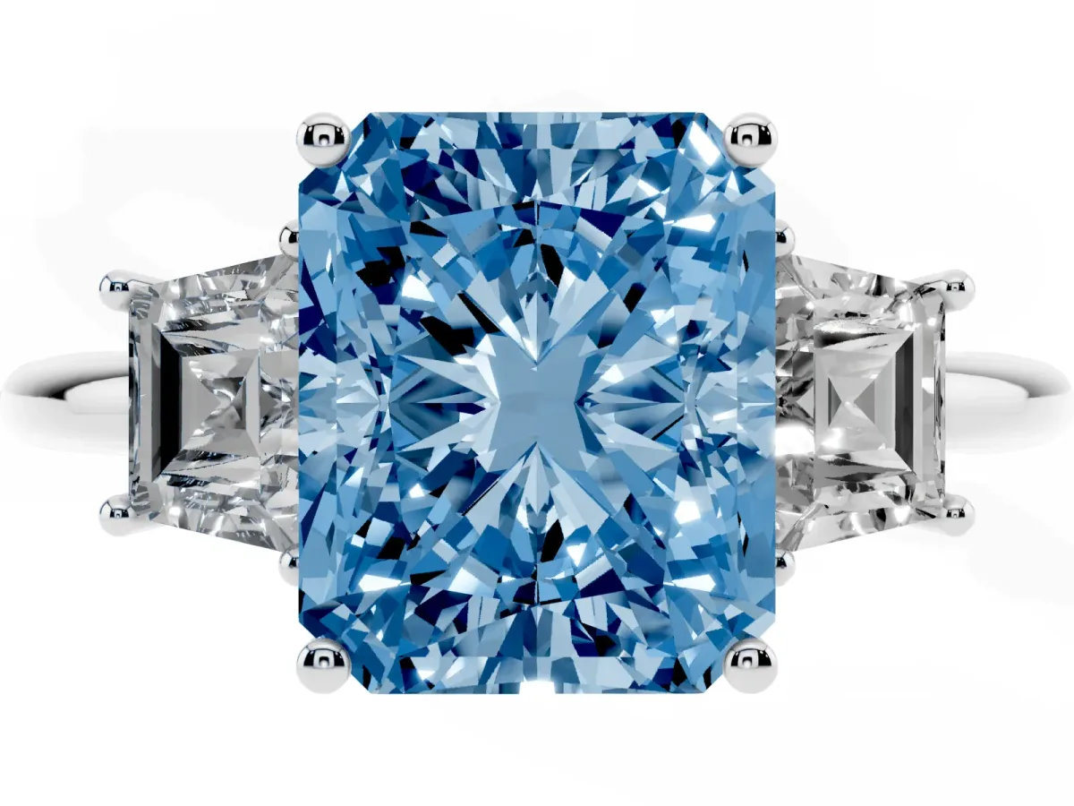 Fancy Blue Radiant Cut Diamond Three-Stone Ring with Trapezoid Side Stones and Prong Setting Silver