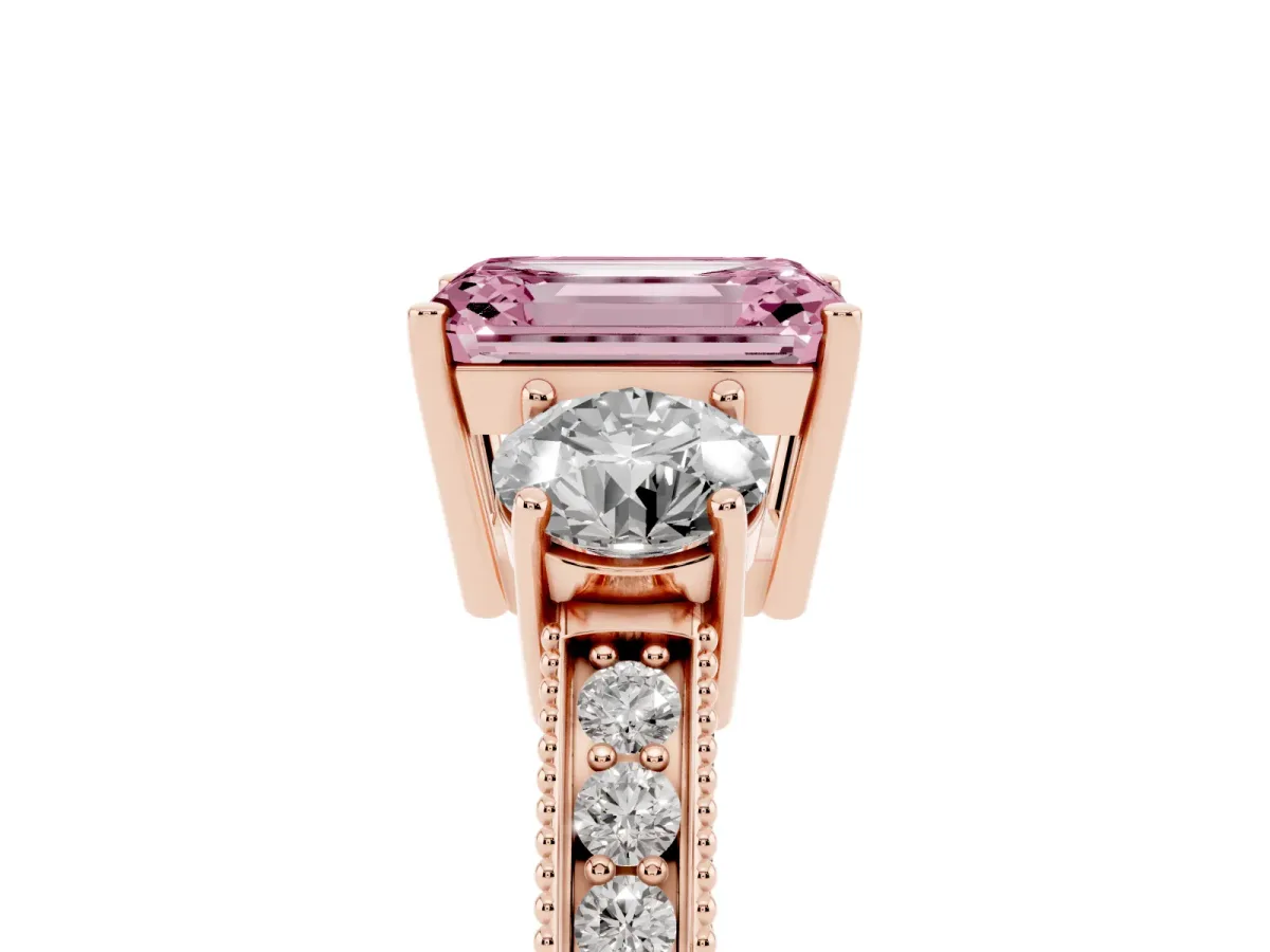 Fancy Pink Emerald Cut Three-Stone Diamond Ring with Pavé Band and Four-Prong Setting Rose gold