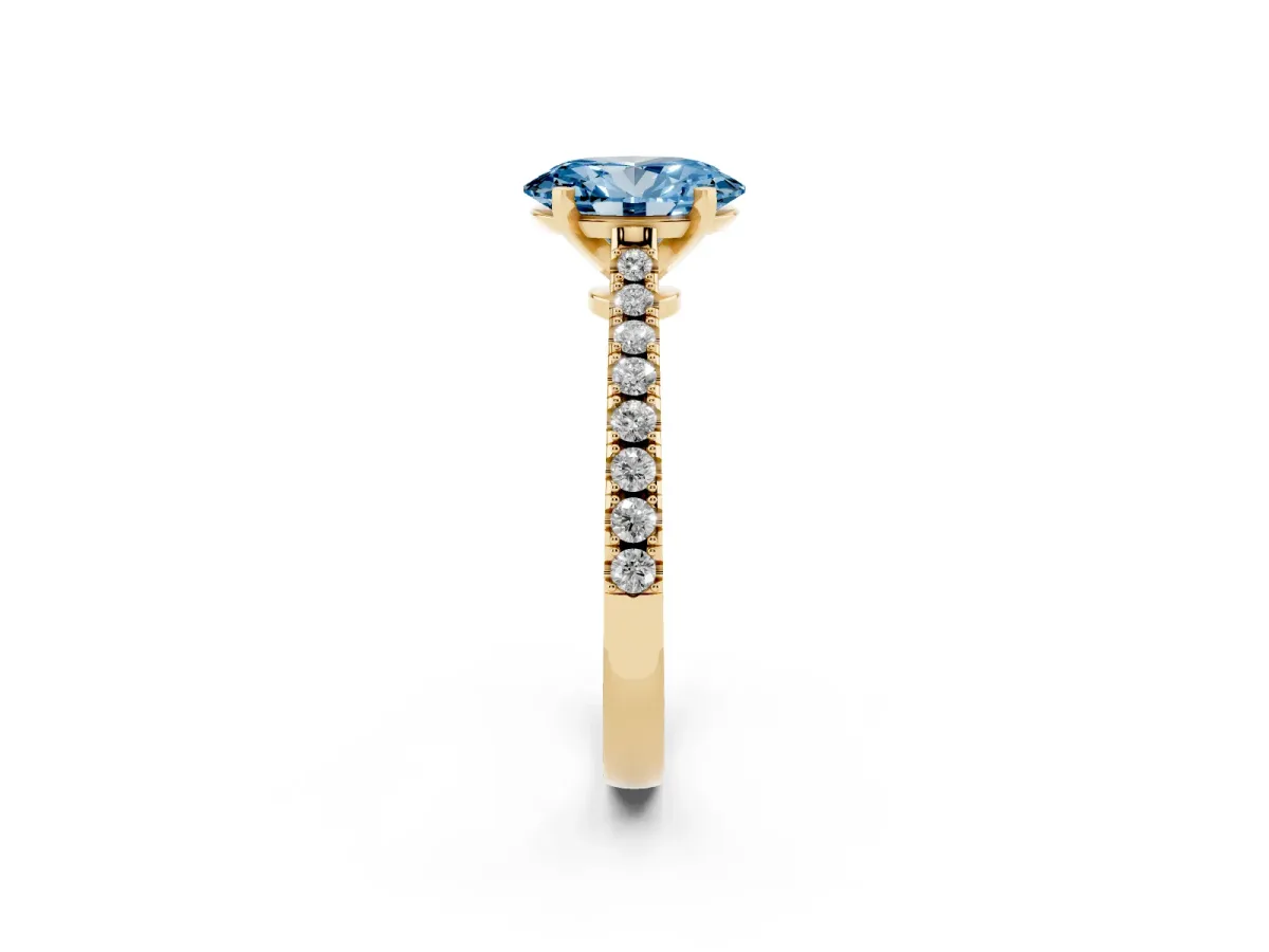 Fancy Blue Oval Cut Cut Solitaire Diamond Engagement Ring with Pave Band and Four-Prong Setting Yellow gold